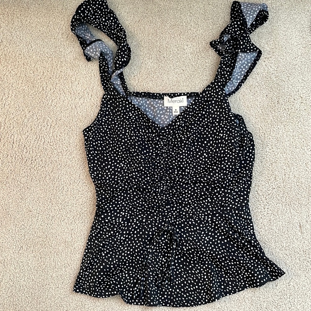 Cute black polka dot top. From a local boutique